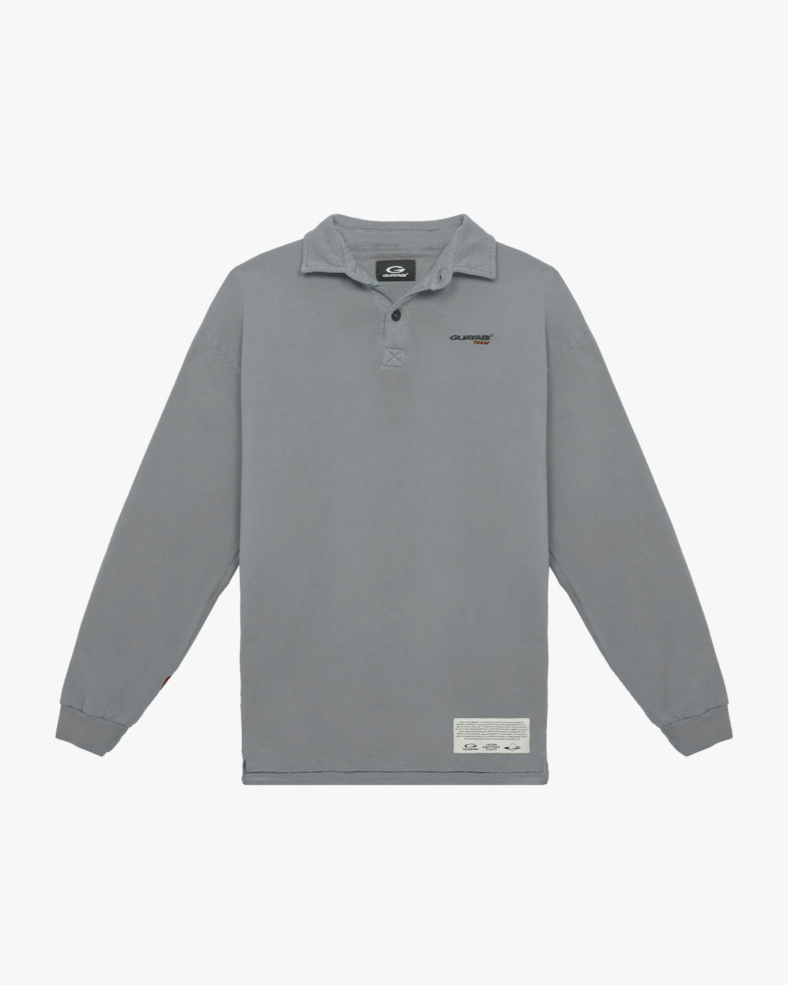 Polera de guayabi color gris azulado. Con bordado del logo y la etiqueta